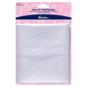 May include: White sew-in interfacing for garments, measuring 1 metre by 1 metre. The packaging is pink with a blue border and features the text "Sew-In Interfacing" and "Hemline".