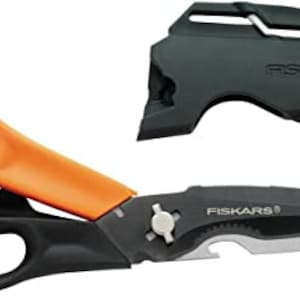 May include: Orange and black Fiskars shears with a black plastic sheath. The shears have a bottle opener on the blade.