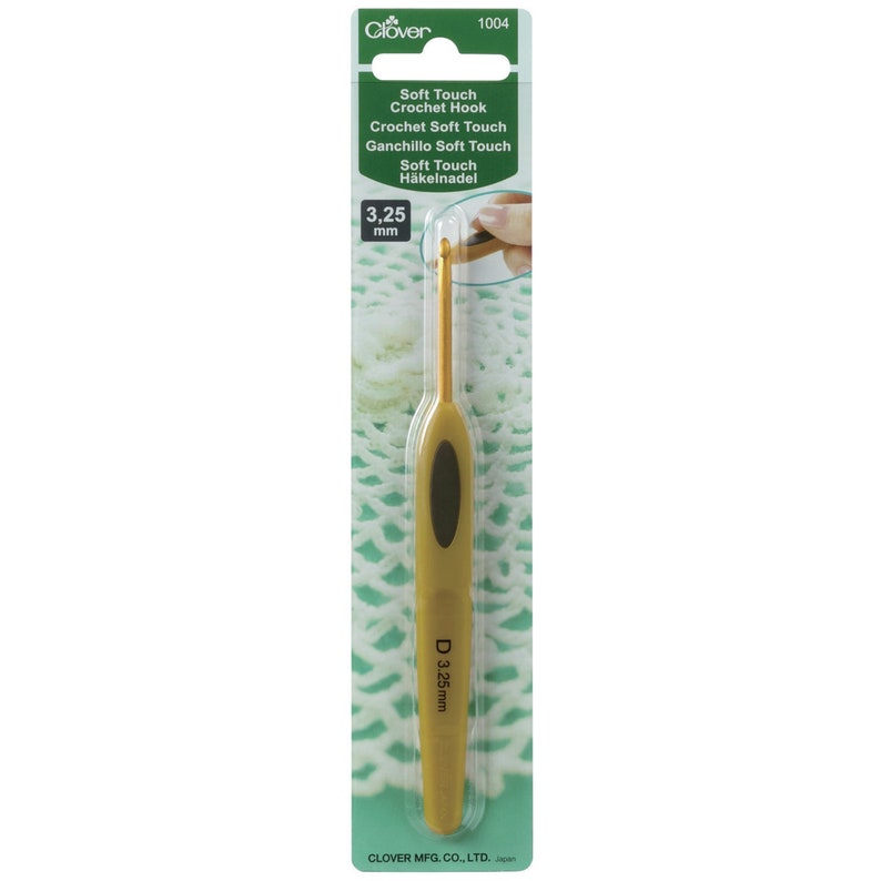 May include: A gold-coloured crochet hook with a soft-touch grip. The hook is 3.25 mm in size and is packaged on a green and white card with the Clover brand name and product information.