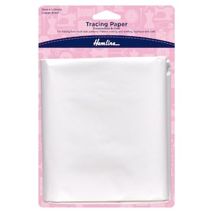 May include: A pack of white tracing paper for dressmakers and craft projects. The pack is pink and features a sewing machine and other sewing-related imagery. The text on the pack reads "Tracing Paper Dressmakers & Craft For tracing from multi-size patterns. Pattern making and drafting. Applique and craft. Hemline".