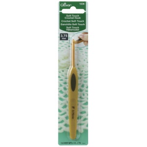 May include: Gold crochet hook with a soft touch grip. The hook is 3.75 mm and is packaged on a green and white card with the text "Soft Touch Crochet Hook" and "Clover 1006".