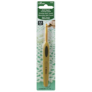 May include: A gold-coloured crochet hook with a soft-touch grip. The hook is 5.5 mm and is packaged on a green and white card with the text "Soft Touch Crochet Hook" and "Clover 1009".