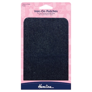 May include: Pack of two 10cm by 15cm iron-on denim patches. The patches are dark blue and are labelled "Iron-On Patches" for decorating and mending. The pack is pink with white sewing-related icons.