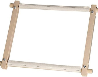 May include: A wooden embroidery hoop with a beige fabric stretched across the frame. The hoop is designed to hold fabric taut for embroidery projects.
