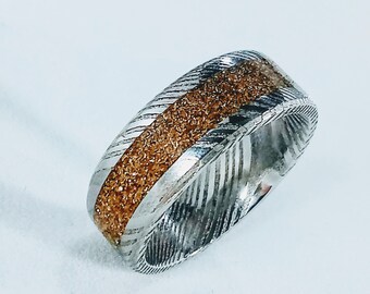 Damascus inlay ring. Stainless steel Damascus with brass inlay.
