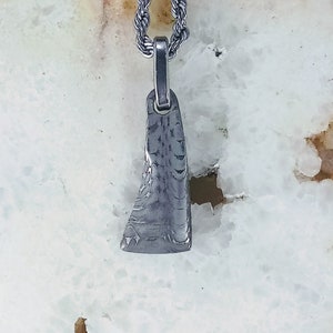 Stainless steel Damascus pendant. Damascus steel pendant.