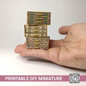 May include: A set of three ceramic nesting bowls in shades of blue, green, and white. The bowls feature a speckled glaze and a simple, modern design. The largest bowl measures approximately 8 inches in diameter.