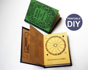 May include: Two miniature books, one with a green cover and the text "The Characters of  Gentlemen and  Gentlewomen" and the other with a black cover and the text "The Zodiacal Symbol" on the front.