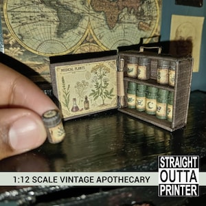 May include: Miniature vintage apothecary set with a wooden cabinet, shelves of labeled bottles, and a small vial. The set includes a detailed illustration of medical plants. The text on the image reads "1:12 SCALE VINTAGE APOTHECARY" and "STRAIGHT OUTTA PRINTER".