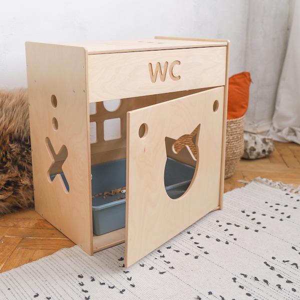 Kattenbak in meubelstijl, houten kattenkast met lade en ingang aan de voorkant, kattenhuis op de vloer van WowHelperCo