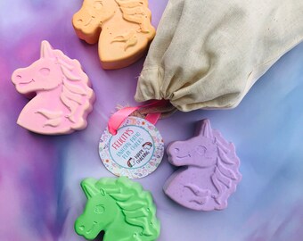 4 Unicorn patio/playground chunky chalks with a personalised swing tag label in a cotton bag.