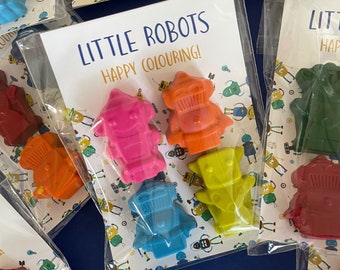 Little Robot Shaped Wax Crayons/Party Packets. Each pack will contain 4 wax crayons. The A7 biofilm packets are biodegradable.