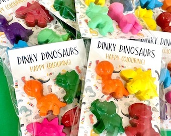 Dinky Dinosaur Shaped Wax Crayons/Party Packets. Each pack will contain 4 wax crayons. The A7 biofilm packets are biodegradable.