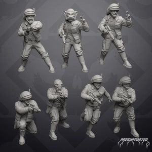 Puede incluir: Un conjunto de siete figuras en miniatura de plástico gris de personajes de Star Wars, incluyendo un Trooper Rebelde, un Piloto Rebelde y un Rodian. Las figuras están en varias posturas de acción, sosteniendo armas y pareciendo listas para la batalla. Las figuras están pre-soportadas y listas para ser impresas.