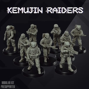 May include: A set of eight grey plastic miniature figures of soldiers wearing futuristic armour and helmets. The figures are posed in various action stances and are holding weapons. The figures are arranged on circular bases and the text "KEMUJIN RAIDERS" is displayed at the top of the image.