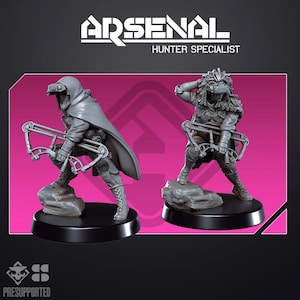 May include: Two grey miniature figurines labelled ARSENAL HUNTER SPECIALIST. Each figure wears a tactical headset and holds a crossbow. One figure wears a hooded cloak, while the other has a textured headpiece. Both stand on black circular bases.