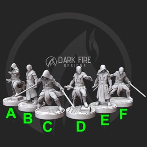 May include: Six grey 3D printed miniature figures of hooded figures holding lightsabers. The figures are standing on round bases labelled A through F.