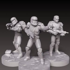 May include: Three grey plastic action figures of soldiers wearing helmets and holding guns. The figures are standing on grey bases.