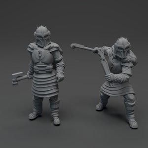 May include: Two gray plastic miniature figures of warriors wearing helmets and armor, one holding a weapon and the other holding a sword.