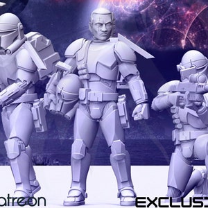 May include: Three detailed, light gray action figures of soldiers in futuristic armor, posed against a dark blue and purple space-themed background. One figure kneels, another stands, and the third holds a helmet. The word "EXCLUSIVE" is visible.