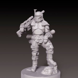 May include: A white, detailed, plastic figurine of a Mandalorian warrior with a rifle and a jetpack. The figure is standing on a small, rocky base.