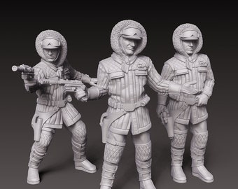 May include: Three gray plastic figurines of a character wearing a hooded winter coat, pants, and boots. The character is holding a blaster in one hand and a pistol in the other.