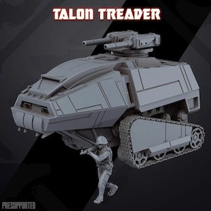 Könnte beinhalten: Ein graues Modell eines futuristischen Panzers mit dem Text "TALON TREADER" in Rot. Der Panzer hat zwei Türme und Ketten. Ein Miniatursoldat rennt mit einem Gewehr. Das Wort "PRESUPPORTED" steht unten.