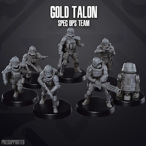 May include: A set of six grey plastic miniature figures of Star Wars clone troopers, with one figure of a droid, all standing on black bases. The figures are part of a "Gold Talon Spec Ops Team" set.