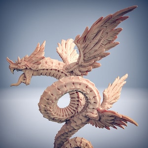 May include: A detailed, beige, plastic miniature of a two-headed winged serpent with a curled body and spread wings.