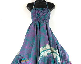 May include: A teal, pink, and gold patterned halter dress with a gathered bodice and a flowing, asymmetrical skirt.