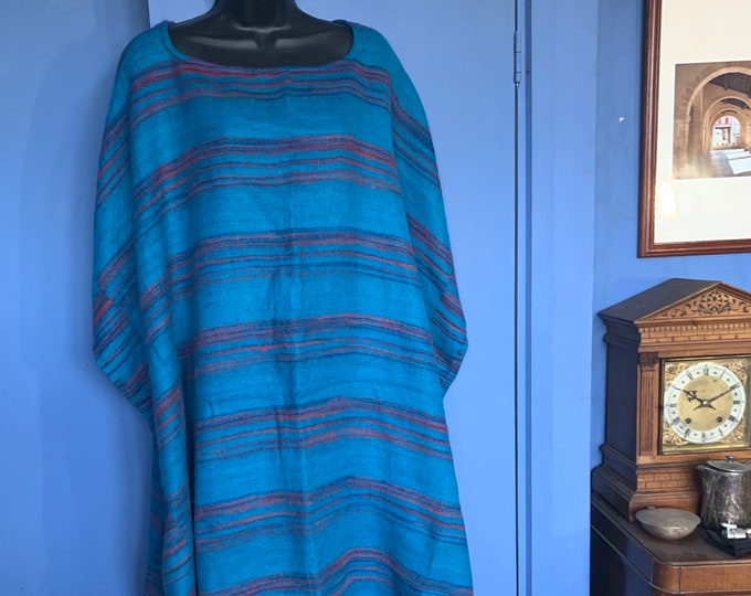 Warm Soft Cosy Poncho. Reversible, One size. Traditional Handmade Blanket style. Turquoise & Red with a Turquoise fringe