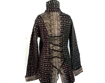 XL. Silk Brocade Tailcoat. Fleece lined with brass poppers and pockets. Corsetage at back for adjustable sizing.