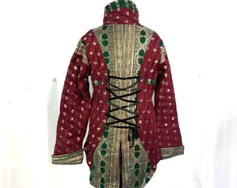 XL. Silk Brocade Tailcoat. Fleece lined with brass poppers and pockets. Corsetage at back for adjustable sizing.