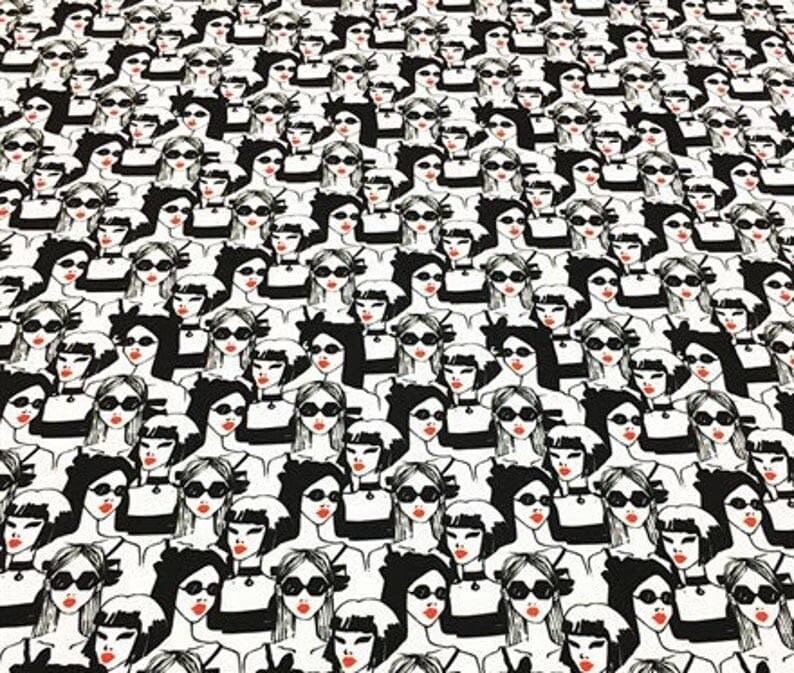 May include: A repeating pattern of stylized women's faces in black and white. Each face wears sunglasses and has red lipstick. The women are closely packed together, creating a dense, graphic design.