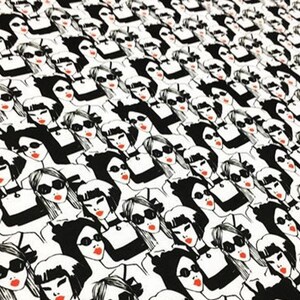 May include: A repeating pattern of stylized women's faces in black and white. Each face has red lipstick and sunglasses. The women are wearing black tops and chokers. The overall design is a modern, graphic print.