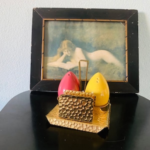 Vintage salt and pepper shaker set in gold
