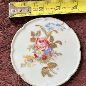 Set of 3 ceramic 4”, small serving plates with floral design. Made in Occupied Japan 1940-1950’s.