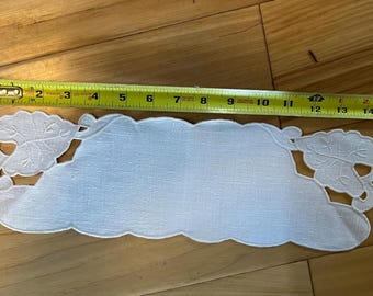 Vintage linen table runner set. Runner and three matching doilies. Lily shaped open work on ends.