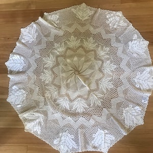 Vintage 54” round crocheted tablecloth