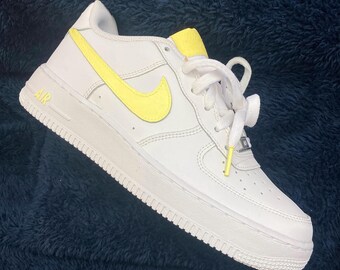 nike air force white with yellow tick