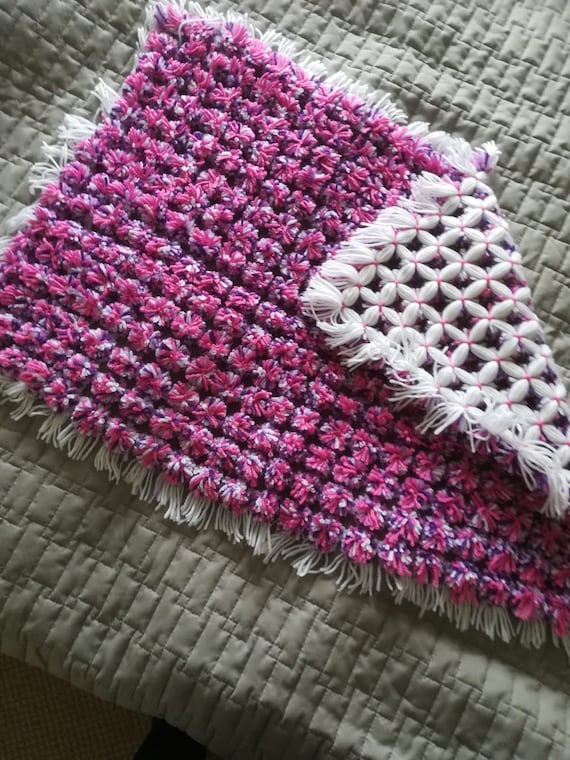 pink pom pom baby blanket