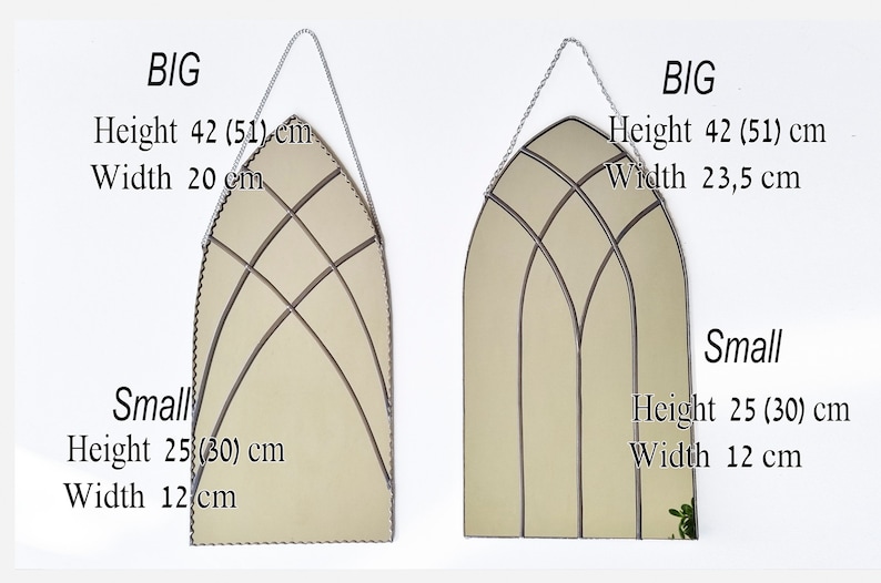 May include: Two arched mirrors with decorative metal frames. The larger mirror measures 42 inches by 23.5 inches, while the smaller mirror measures 25 inches by 12 inches. Both mirrors have a beige background.