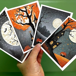 Conjunto de cartões de Halloween – 4 designs assustadores ao luar. Casas mal-assombradas e abóboras. Caixa de presente com envelopes. Adesivos disponíveis para selar.
