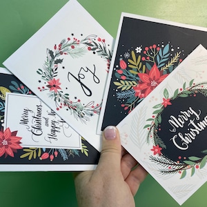 Set de tarjetas navideñas: 4 diseños festivos, sobres y pegatinas disponibles. ¡Perfectas para mensajes navideños conmovedores! En caja de regalo. Personalízalas.