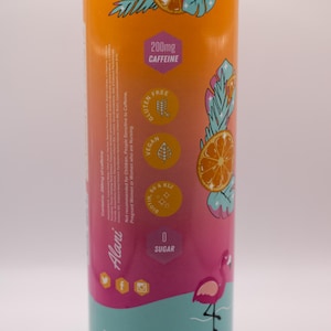 May include: A cylindrical tumbler with a gradient design, transitioning from orange to pink to teal. It features a flamingo graphic, orange slice illustrations, and text indicating 200mg of caffeine, gluten-free, vegan, and zero sugar.