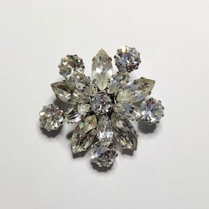 Vintage Rhinestone Starburst Brooch: Austria Silver-Tone Pin