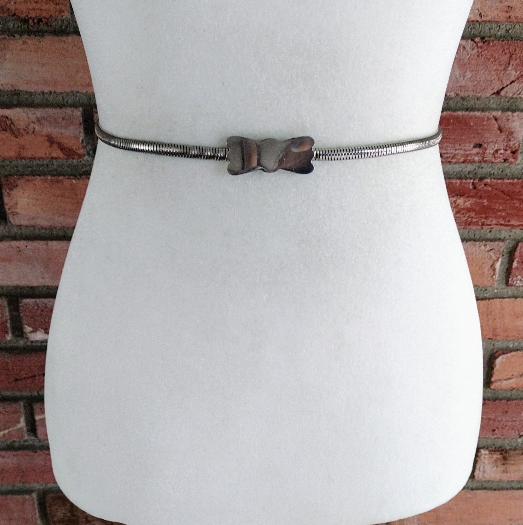 Vintage Snake Belt Silver Metal Thin Slinky Stretch Bow Tie Shape