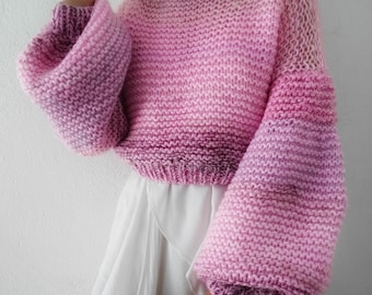 Patrón de tejido de suéter rosa pastel suave