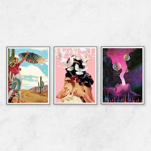 May include: Set of three framed art prints. The first depicts a woman reaching for a UFO in a desert landscape. The second shows a person with doves around their head. The third features a face with planets and a colorful cosmic background.