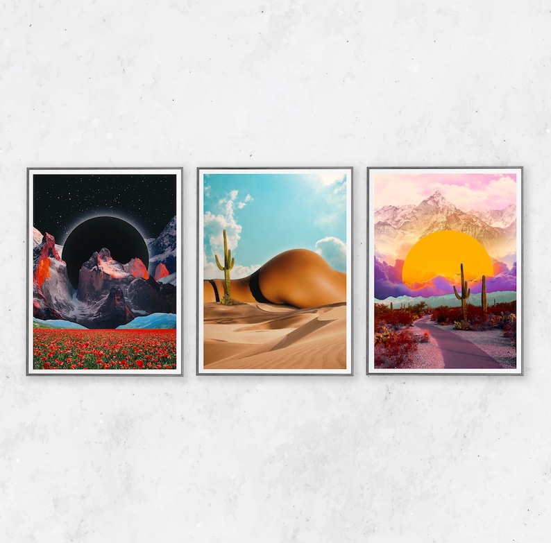 May include: Set of three framed art prints. The prints feature surreal landscapes with a desert theme. One print shows a desert scene with a person lying in the sand. Another shows a sunset over a desert landscape. The third print depicts a surreal mountain scene.